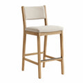 Chaise de bar 102 x 47 x 53 cm en hévéa massif assise rembourrée tissu polyester beige structure bois naturel repose-pieds acier gris